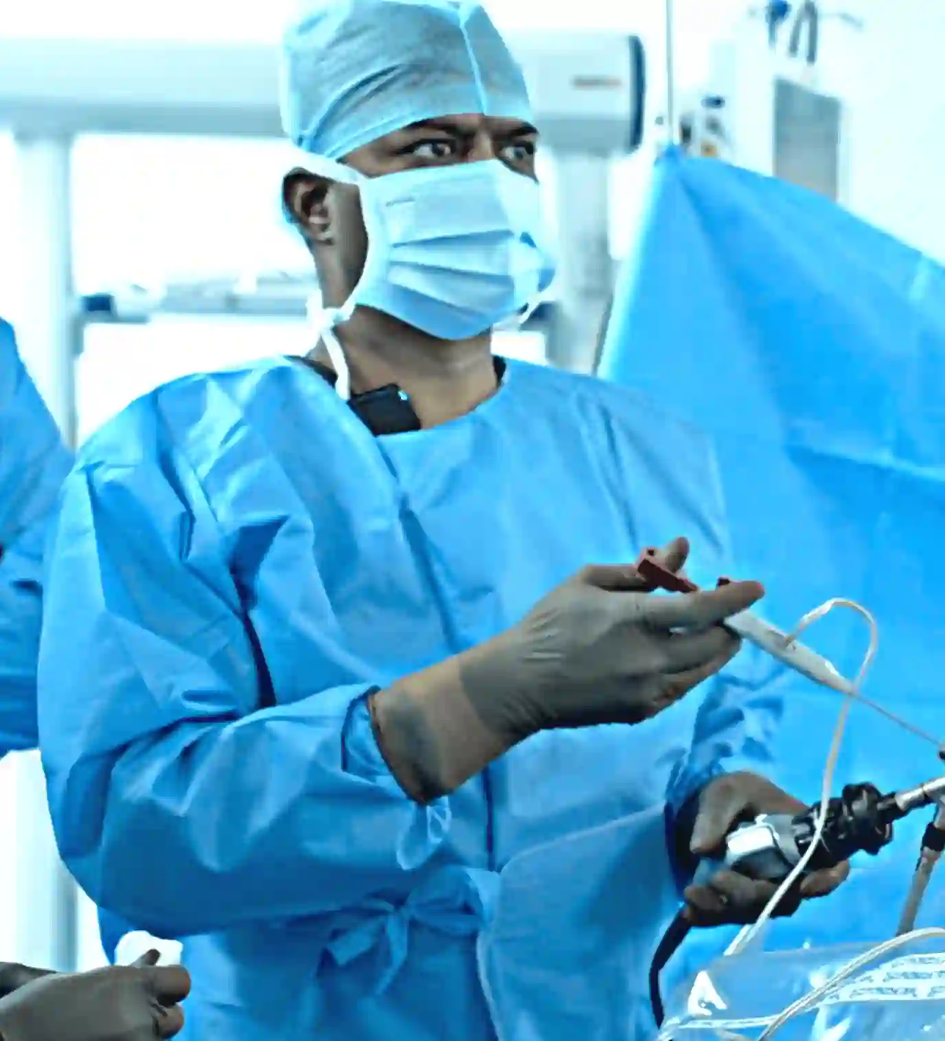 Dr. Sura performing endoscopic spine surgery